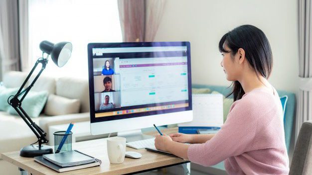 https://www.augmentt.com/wp-content/uploads/2020/04/back-view-asian-business-woman-talking-her-colleagues-about-plan-video-conference_73503-1717-e1593523271357.jpg